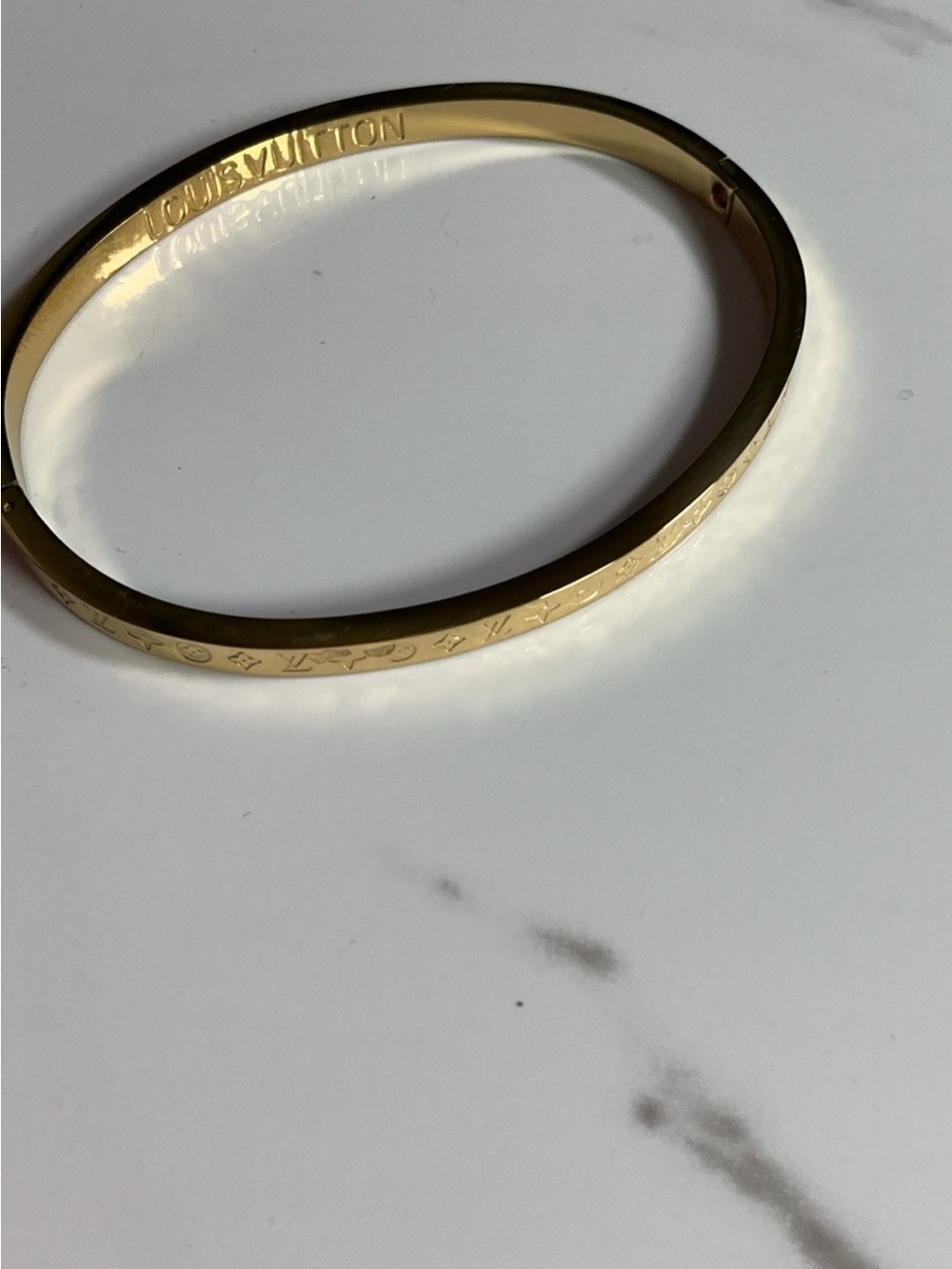 Louis Vuitton Gold Tone Slim Signature Bangle Bracelet